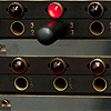 <p style='text-align: left; margin-bottom: -10px;'>Knobs for voltage control on top row; switches to set off a gate in the middle row. Bottom contains inputs and outputs, and switches for master/slave modes.</p><br>Photo by Seze Devres
